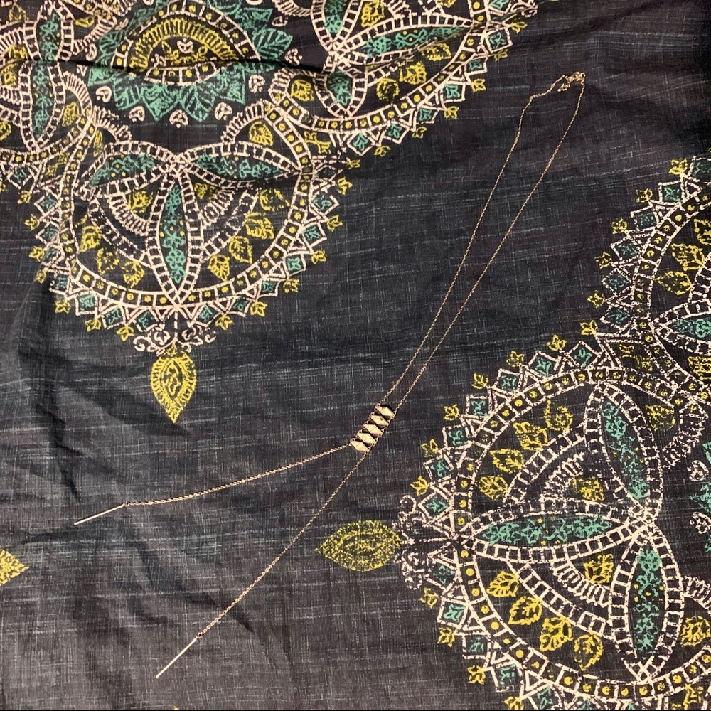 Long silver layering necklace with marble detail